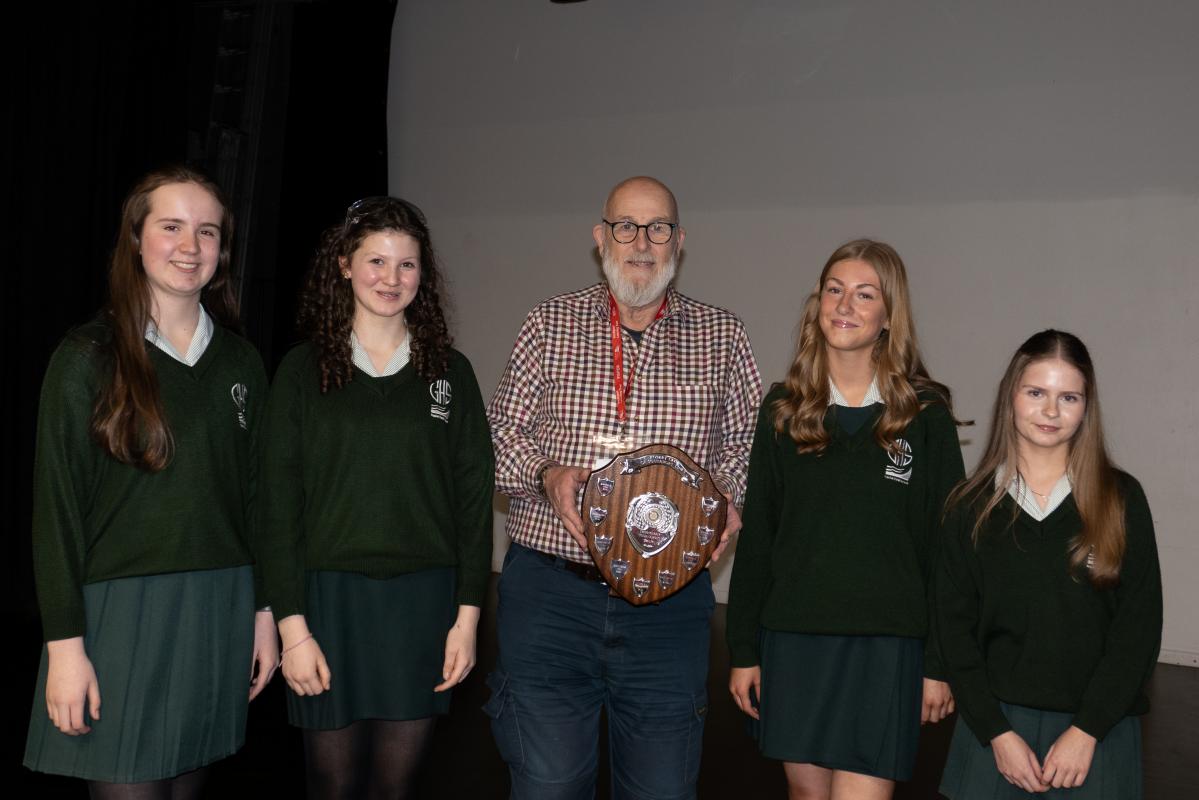 The team from Greenbank are presented with the winners shield by President David Taylor.