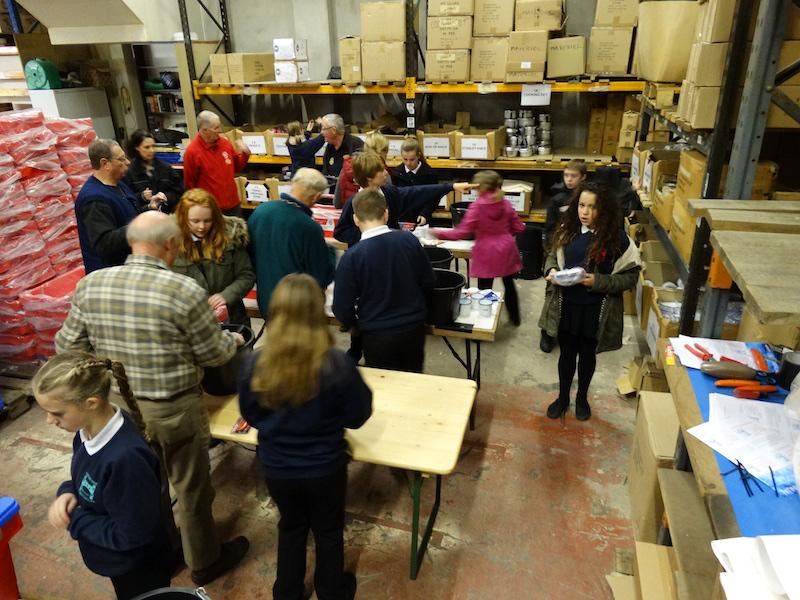 Pupils from Ashton Park School, Bristol. Assisting with packing. -  