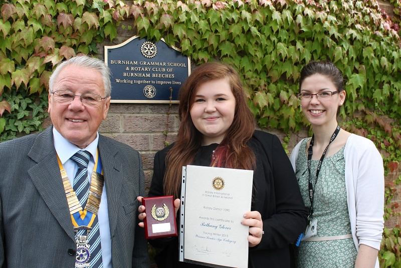 Bethany Glover receiving her award from President Brian Kay with Miss Jo Shave, Director of English Burnham Grammar School