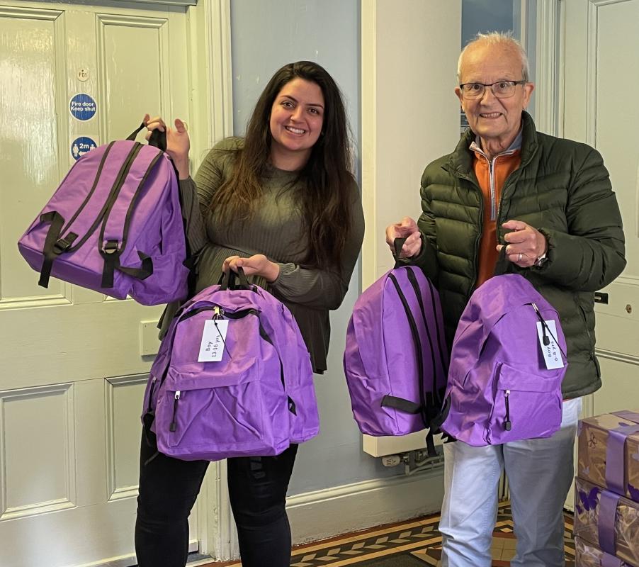 Leslie Lee presents another 30 bags to a local refuge