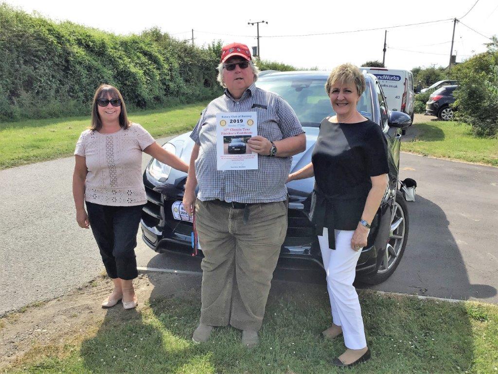 Catherine, Derek and Linda display their certificate