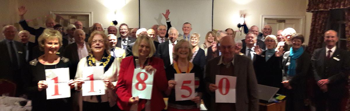 Members celebrate the success of this year's Christmas fundraising efforts