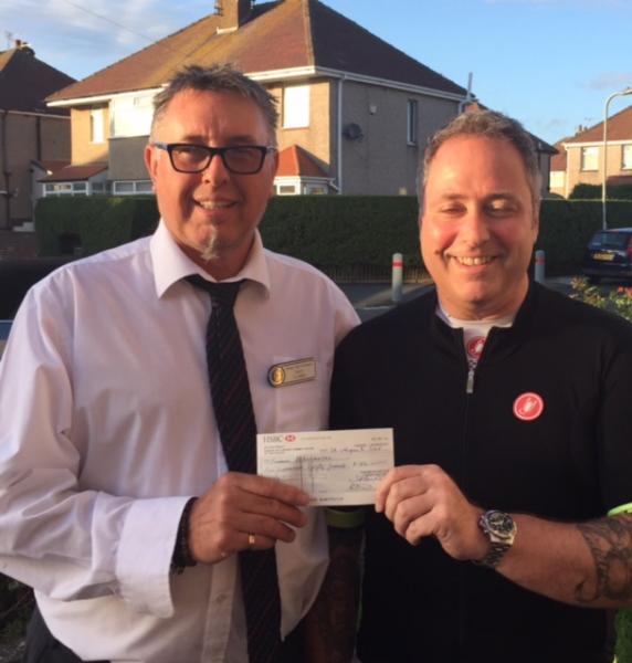 Tony Clarke making the presentation on behalf of Rotary Club of Furness