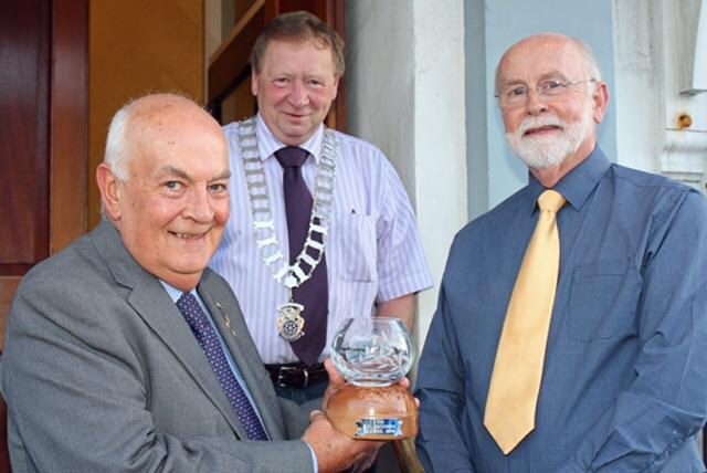 Picture shows Derek presenting the bowl to Iain. Looking on is current President Gordon Steele.