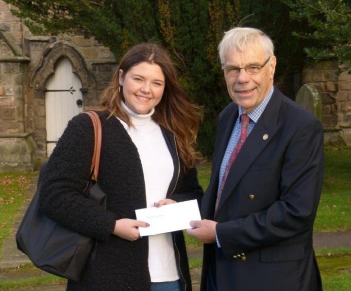 Phoebe Sanderson with Rotarian Brian Massey