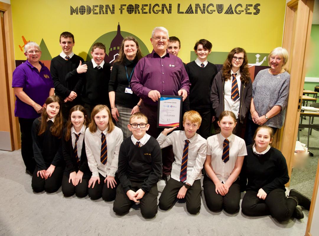 Ian Dow, past District Governor with school pupils 