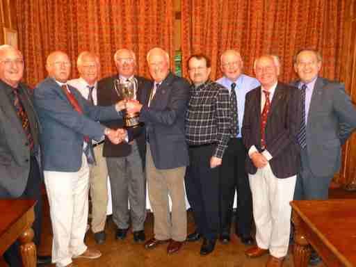 The Rotary Club of Southport LInks Quiz Team, Gerald Johnson, Chris Sumner, Tom Farley and Bill Thomas receive the District Quiz Trophy.