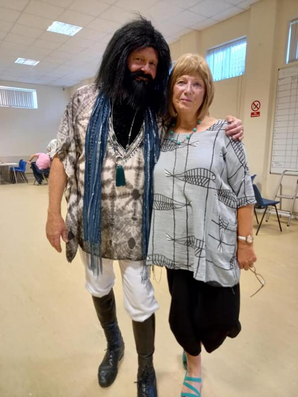 Quiz Night - theme 'Postcard from the Med' - Our compere Demis (Kevin) Roussos together with his wife, our President  Caroline Winzer