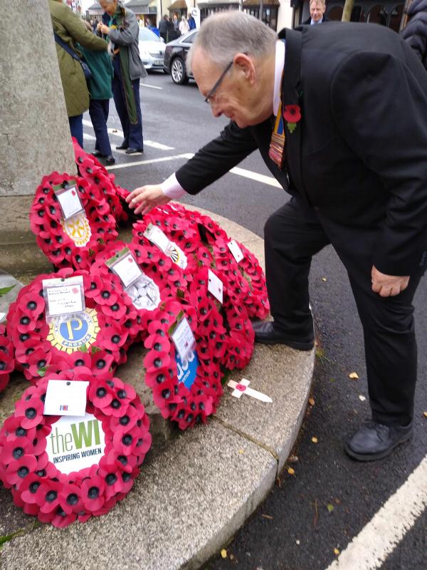 President Colin Bradley laying a reef on behalf of Dunmow Rotary.