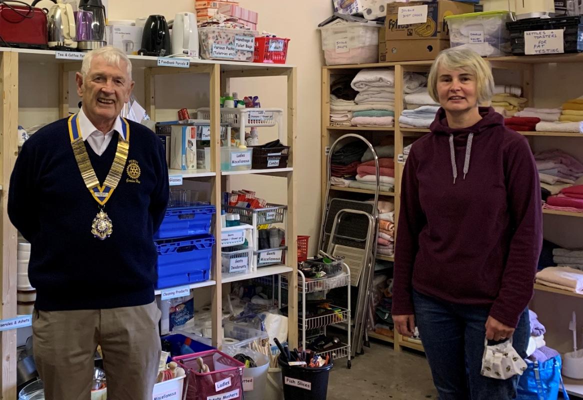 The photograph shows Gordon meeting with Perth Starter Packs Secretary Anne Hughes at their premises in Riverview Business Park.