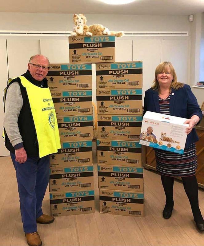 Knaresborough Rotarian Jonathan Beer delivers Robotic Companion Cats to Dementia Forward’s Chief Executive Jillian Quinn.                                                                                   