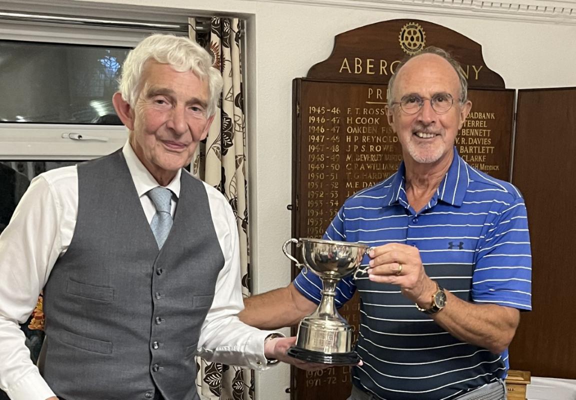 Abergavenny Captain Vernon Heritage presenting Crickhowell Captain Anstie Blackham with the Everest Cup for 2022.