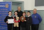 Winning quiz team members from Bridge of Allan Primary School with quizmaster Peter hill and Ivor Butchart (president of Bridge of Allan & Dunblane Rotary Club)