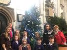 Pupils of Queens Hill School - proud of their tree which highlights climate change and the environment/