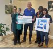 President James Slinn presents cheque to Sara Lee Trust