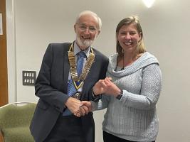 New Club member Dawn Roberts-McCabe welcomed by President Robin