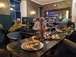 Members and friends listen intently to guest speaker Ian Lowes