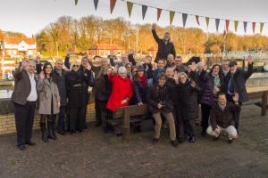 A whole bunch of Rotarians after a jolly good lunch...