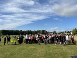 The competitors march in