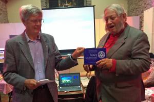 Graham Moss presents the MHBF plaque to the Hirnant Chair of Trustees the Rev'd Kit Carter