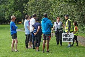 Event Director Carron Boulton briefing runners completing the course for the first time.