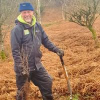 Peter Wigglesworth Planting some of our Carbon Offset trees on the Eastern Moor