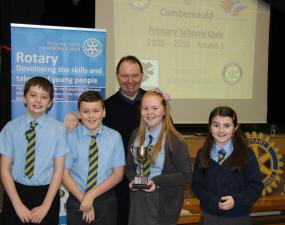 Henry Gaffney, Daniel Shaw, Rachel McAuley, and Colette Carr from St Helen's Primary School, pictured with Kenny MacGregor of the Rotary Club of Cumbernauld