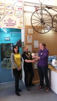 President Erica presenting the cheque for Â£250.