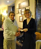 President Ivan presents a cheque to Heather Lewis