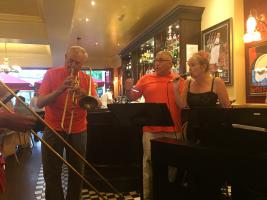 Entertainment at Cafe Rouge with our French guests taking the microphone