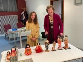 Lilia with some of her collection and President Liz Stewart-Smith.
