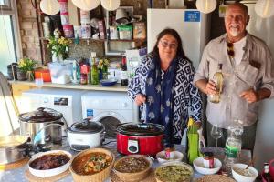 Mandy Davis and John Windsor with the initial selection of curries