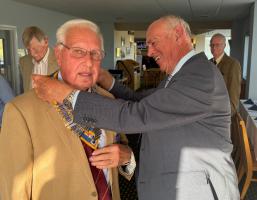 Pres Mike hands over to Pres David