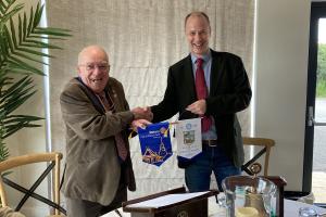 Exchange of banners with Rotary Club of Phnom Penh, Cambodia