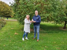 Our President Elect, Simon Keeling, presenting crocus corms to Rachel Taylor from the Friends of Alvaston Park.