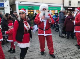 Ray Seager leading the carol singing