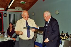 .Alan Holmes receiving from Len Smith