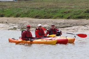 Three Old Men in Boats