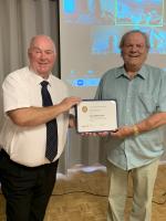 John (on left) presents PH award to Alan