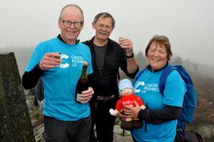 Bill Honeywell, Bill Birkett and Val Honeywell celebrating reaching the 542nd summit in 2016