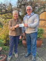 The Mayor of Abergavenny, Samantha Dodd, is pictured making the presentation to Ken Broadbank accompanied by Rotary Club President, Brian Roussel.