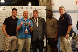 Rich Slade proudly receiving the trophy