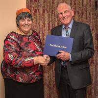 President Cate presents a Paul Harris Fellowship to Nigel Lindsay