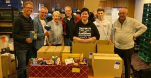 Gemma Jimmison from the Wakefield Express and members of the Rotary Club of Wakefield Chantry packing hampers in 2019.