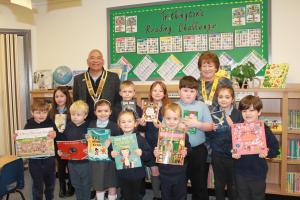 President Arif and a vice President Julie with the children at Tritlington First school