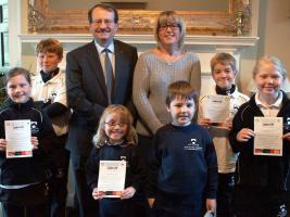 Pupils from Oswestry School Bellan House received certificates from Rotarians Steve Thomas and Emma Wilde