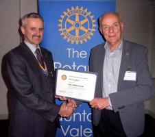 President Colin Barrell presenting Bill Tregillus with a Paul Harris Fellowship in recognition of his outstanding contribution to the service of the Club for many years.