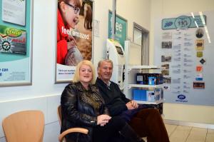 Rotarian Robert Allan and a member of the public wait to have their blood pressure checked