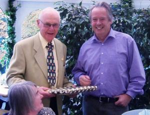 President Jim Swift honours Brian Walsh with a print of the High Peak and a Club Citation