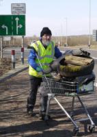 Brian collecting litter